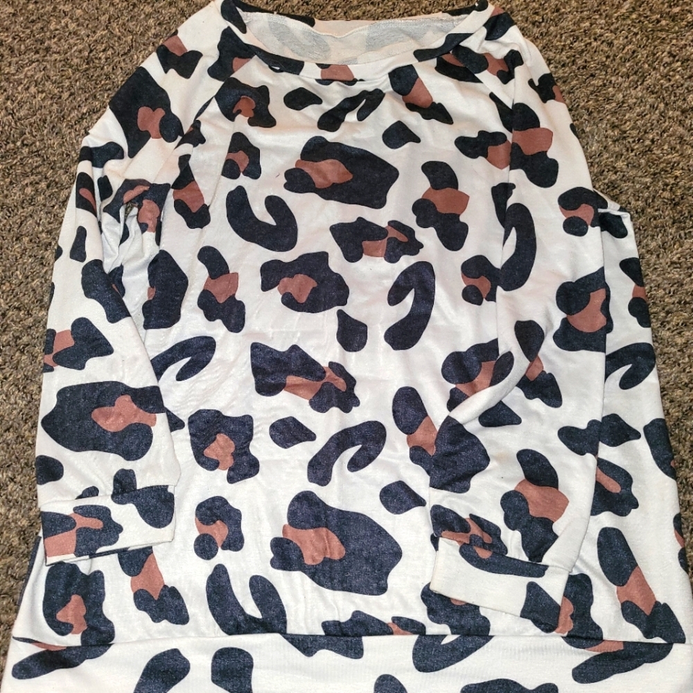 Cow print long sleeve top with scoop neck size large boutique brand